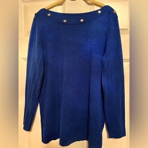 Blue sweater rimmed with diamond embellishments